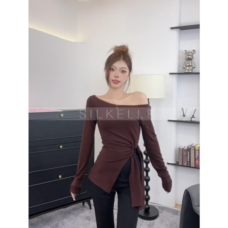 Irregular side slits, slim waist, slightly transparent long sleeves, elegant slim fit top